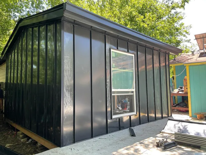 Black standing seam metal wall panels for Roof Inspection in Lonsdale