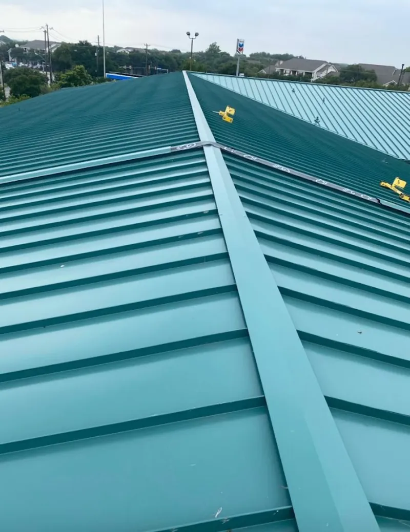Green commercial metal roof ridge and valley for Metal Roof Repair in Lonsdale